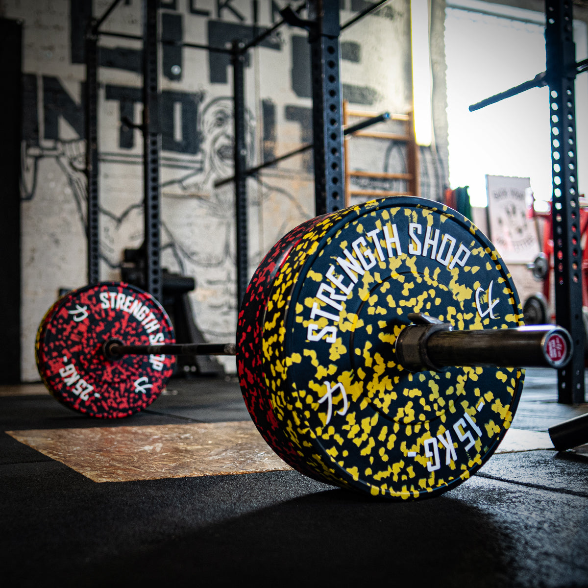 B-WARE Fleck Rubber Bumper Plates – Colour Coded, 5kg-25kg - Strength Shop