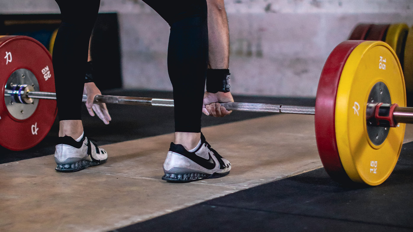 Home Gym Flooring: Rubber Tiles, Drop Pads, Turf or a Lifting Platform?